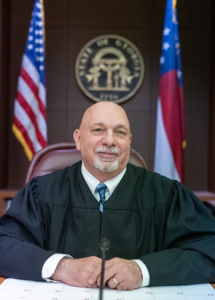 Official portrait of Judge Jay M. Roth in judicial robes.