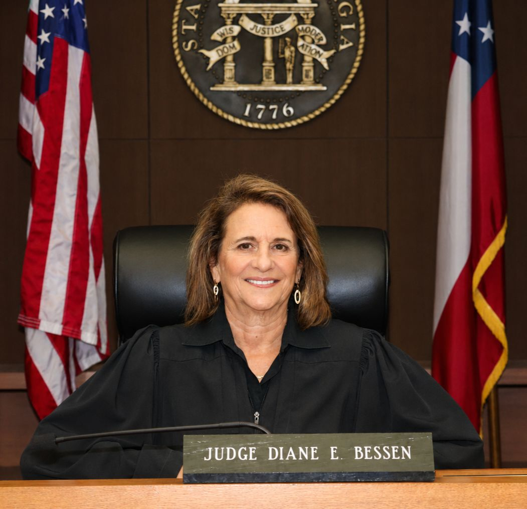 Official portrait of Judge Diane E. Bessen in judicial robes.